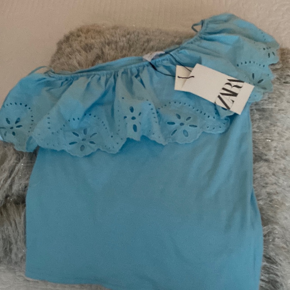 A shirt for girls size (13-14)